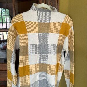 High collar, plaid sweater
